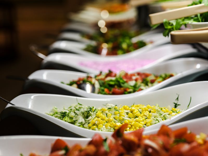 Catering food spread with sides and salads
